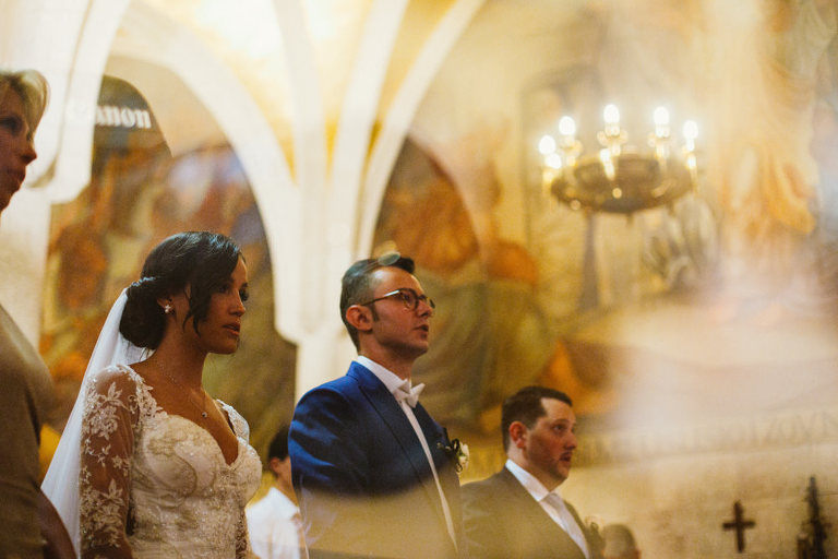 double exposure of bride and groom in church