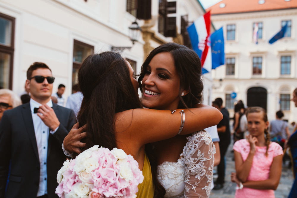 bride hugging her sister from Zurich on a wedding