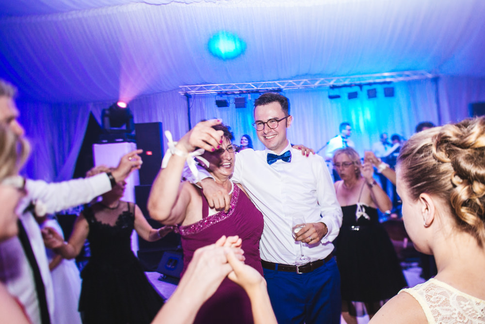 groom and his mother dancing together